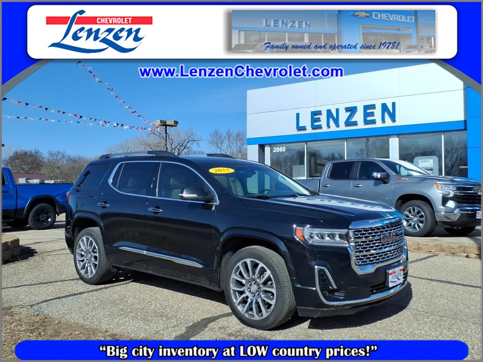 2023 GMC Acadia Denali in Ebony Twilight Metallic — front three-quarter view