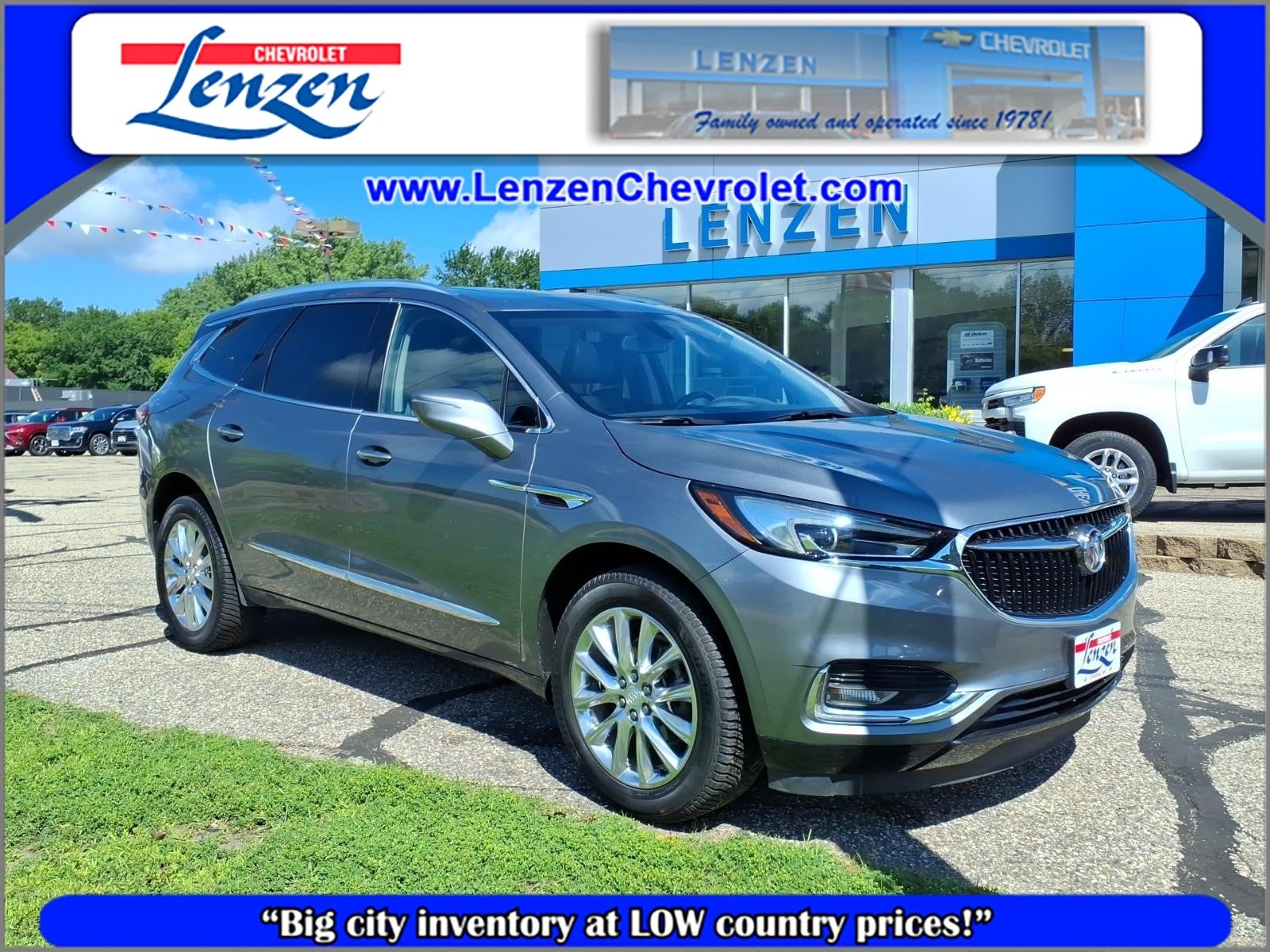 2021 Buick Enclave Essence in Includes Pitch Dark Night Lower Exterior Accent Color.) — front three-quarter view